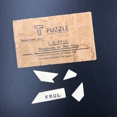 2d78c887-cda0-4ab4-9cf0-4352afea5ac6.jpg; 1993-0049-HHI; Klein envelopje van J.A. Krul met daarin een spelletje; spelmateriaal
