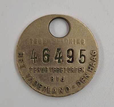 30cd5730-d203-4d72-96d0-61c3dab89d78.jpg; 2021-0001-PEO; Penning van 'Het Vaderland, een goede krant'; penningen (betaalmiddelen)
