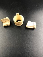 4b15a4f5-ad32-4955-9182-fda16bb7d062.jpg; 1960-0259-KPO/026; Benen boterkarn met daarin twee handdoekjes; tonnen