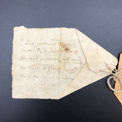 845269d3-3ce0-486e-8e86-40b6f1881d62.jpg; 0000-0178-OME/b; Briefje horend bij gouden ring met portret van M.H.H. Tromp; brieven (correspondentie)