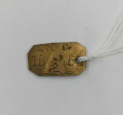 84c2b6a9-8271-4b89-86d9-2e4219df520e.jpg; 0000-0467-PEO; Hondenpenning uit 1862; hondenpenningen (belastingpenningen)