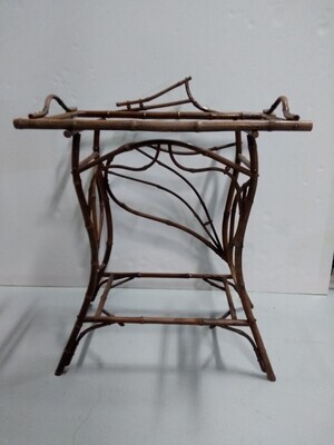 bd15d60b-c833-4355-a08e-aa0881e2fcf7.jpg; 1982-0075-MHO; Bamboe tafeltje op vier gebogen poten, tussen poten grillig gevormde bamboestokken.; theetafel