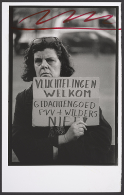 c1ee53b1-8607-4e72-92a9-4b5171c7b6ef.jpg; 2023-0019-PRE; Vrouw demonstreert tegen Wilders en de PVV; portretten