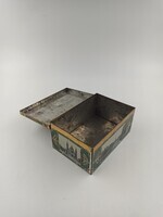 ea85a3db-2c85-477c-ad32-8ad5e96483fa.jpg; 1972-0006-HHI; Blikken koektrommel met een afbeelding van Brood en beschuitfabriek 'De Oude Vette Hen'.; koektrommels