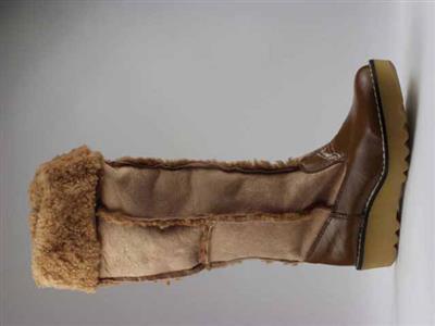 01461.jpg; 01461; Knielaars van gekeerde schapenvacht in patchwork motief; knielaars