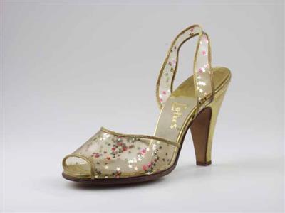 08669.jpg; 08669; Sandalet met hoge hak en schacht en hielband van transparante kunststof, gedecoreerd met glittersterretjes.; sandalet