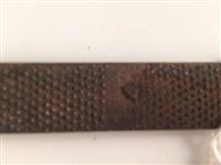 89452.1.jpg; 89452; werktuig met verschillende oppervlakken om zolen, zoolranden en hakken glad te maken en af te werken.; rasp