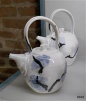 72d00cf3-fc63-4f79-80a2-76decb13e954.jpg; 8689; Set van vier theepotten; theepot