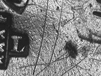 11521_C.bmp; 11521; Zilveren miniatuur man met een valk op een stok; miniatuurfiguur